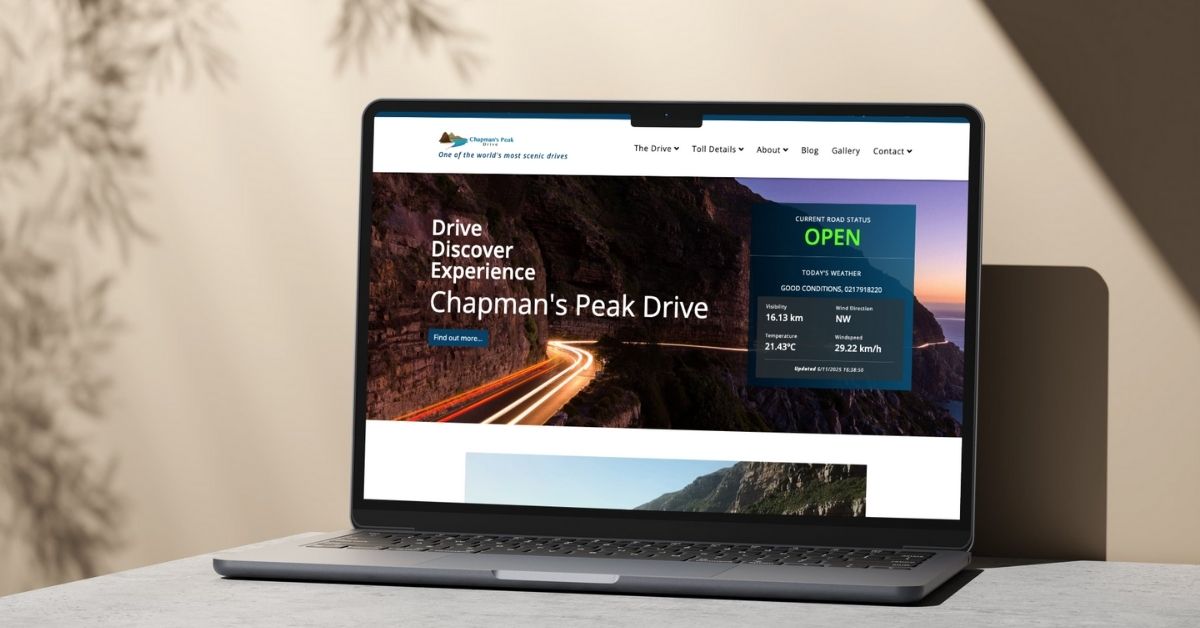 The Chapmans Peak Website being displayed on a laptop