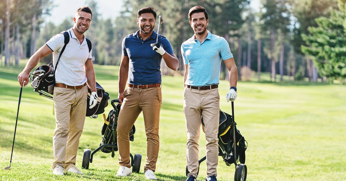 Three menu in golf attire playing golf at royal cape golf club