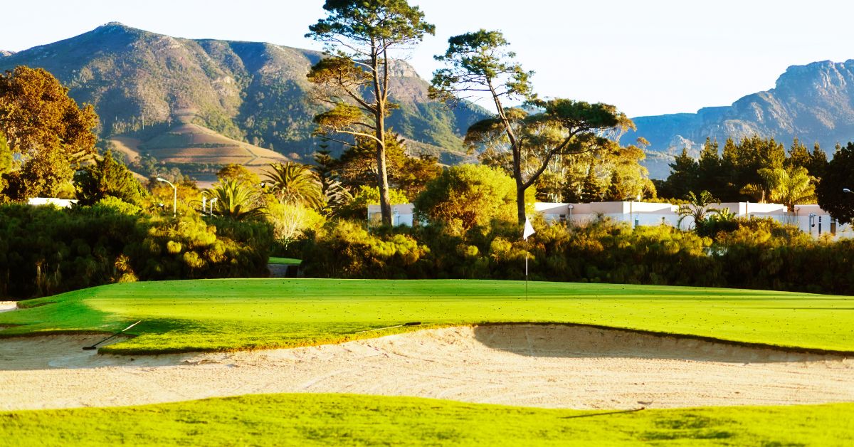 royal cape golf club with a view of the mountain in the background