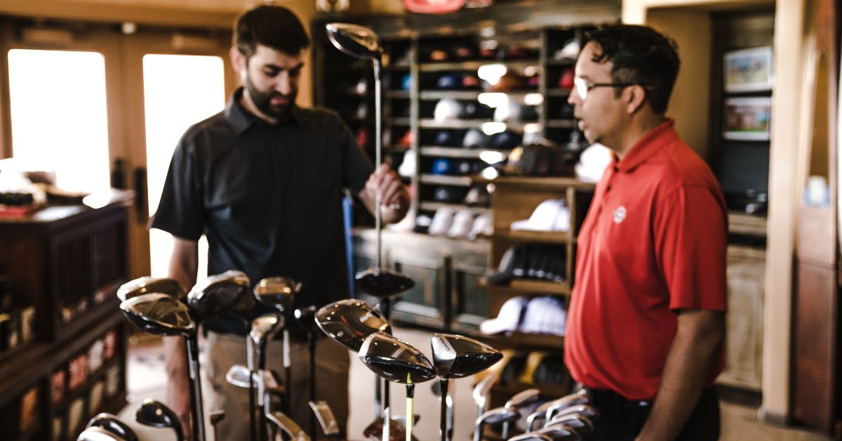 rondebosch golf club pro shop with a customer and salesman