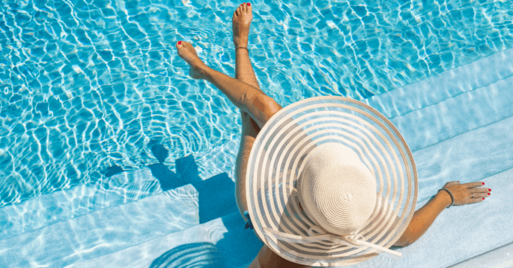 Relaxing on the steps of a swimming pool at one of the best guest houses in Cape Town