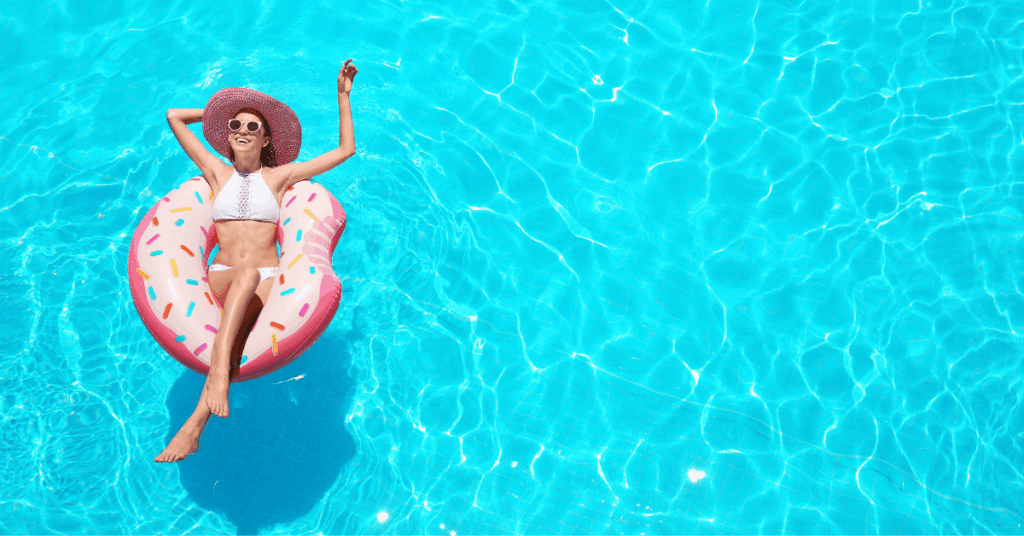 Woman floating in a pool at one of the best guest houses in Cape Town