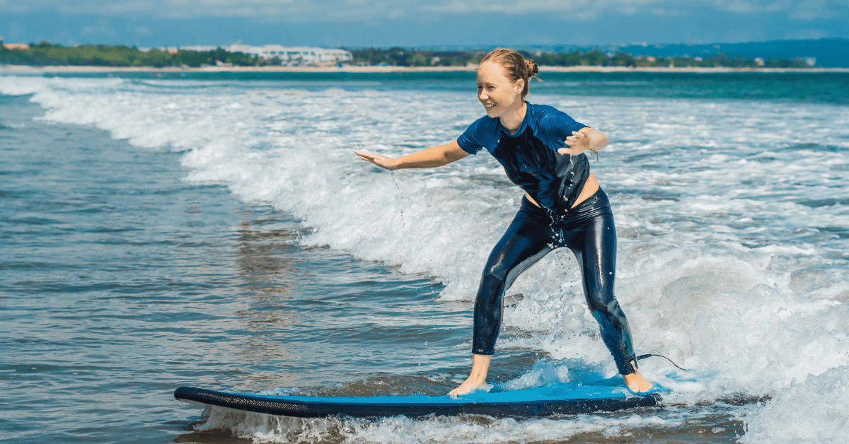 A lady doing Surf Lessons Cape Town
