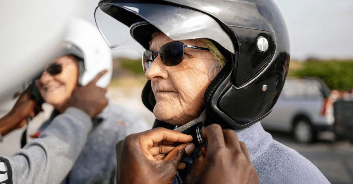 Quad Bike guides putting helmets on their clients during Safety brief 