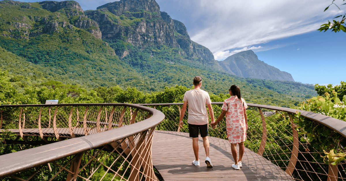 A couple walking through the Kirstenbosch Garden Walkway
