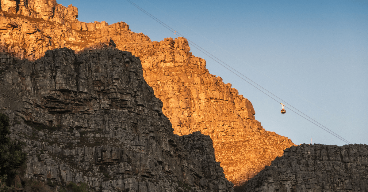 cape town winter months - View of the Cableway to the top of Table Mountain at sunrise 