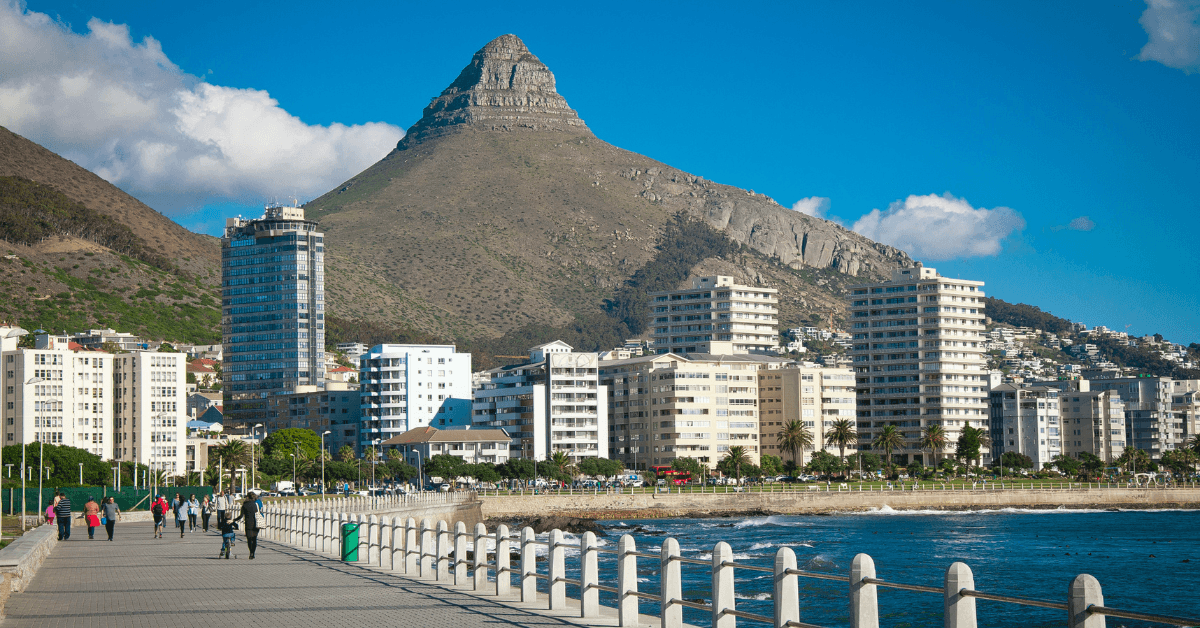 View of Sea Point Promenade with Loins Head in the background in Cape Town 