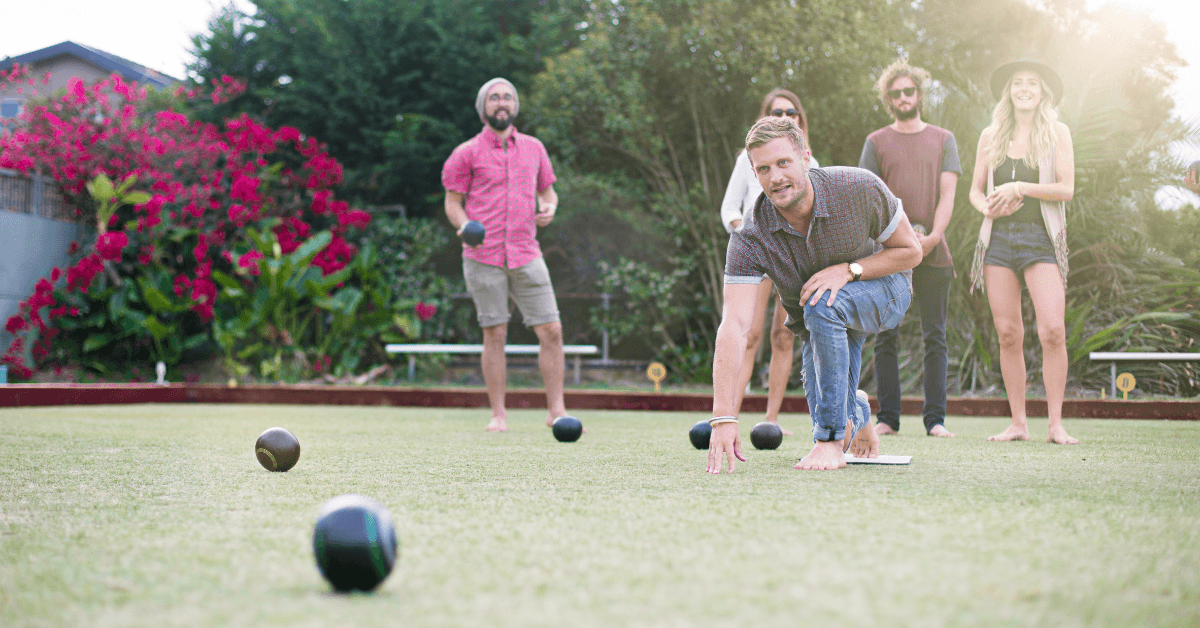 Fun Year-End Function Ideas - Group of colleagues enjoying a game of Lawn Bowling in Cape Town 