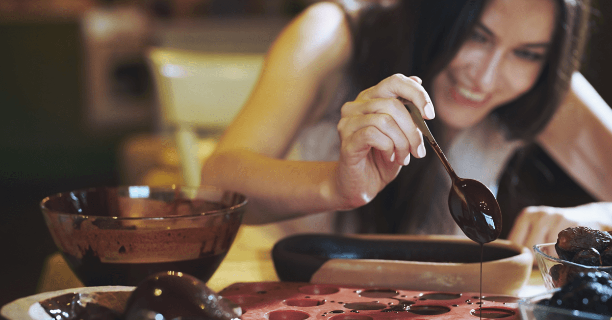 Person making chocolate at Honest Chocolate Factory 