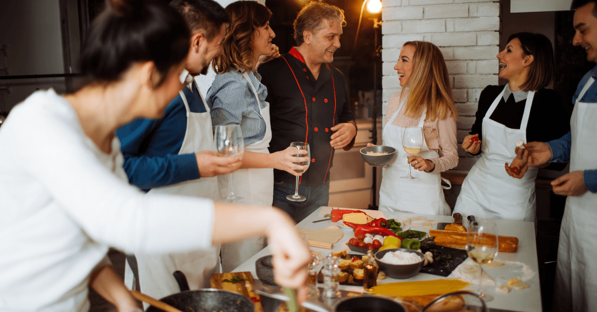 Group cooking together at Food Jams Restaurant for a Fun Year-End Function